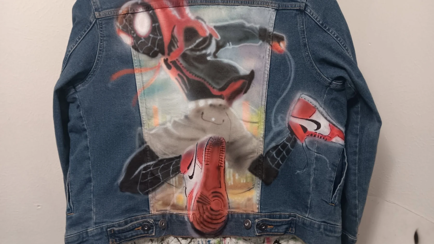 Custom painted comic inspired denim jacket