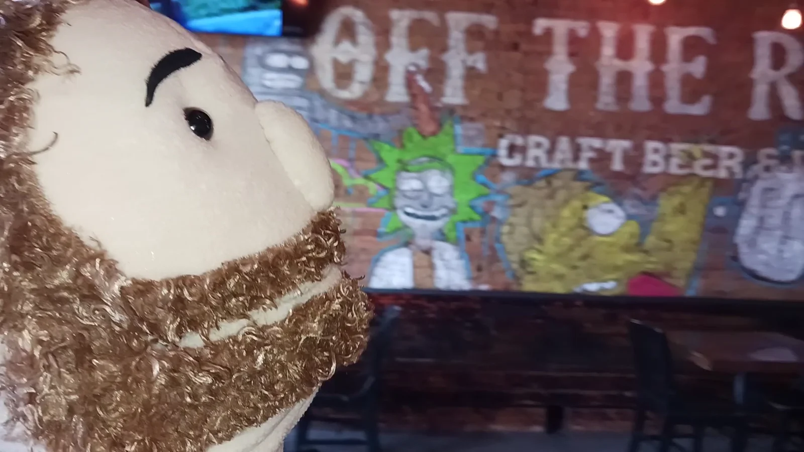 Custom puppet character visiting a venue and painted environment