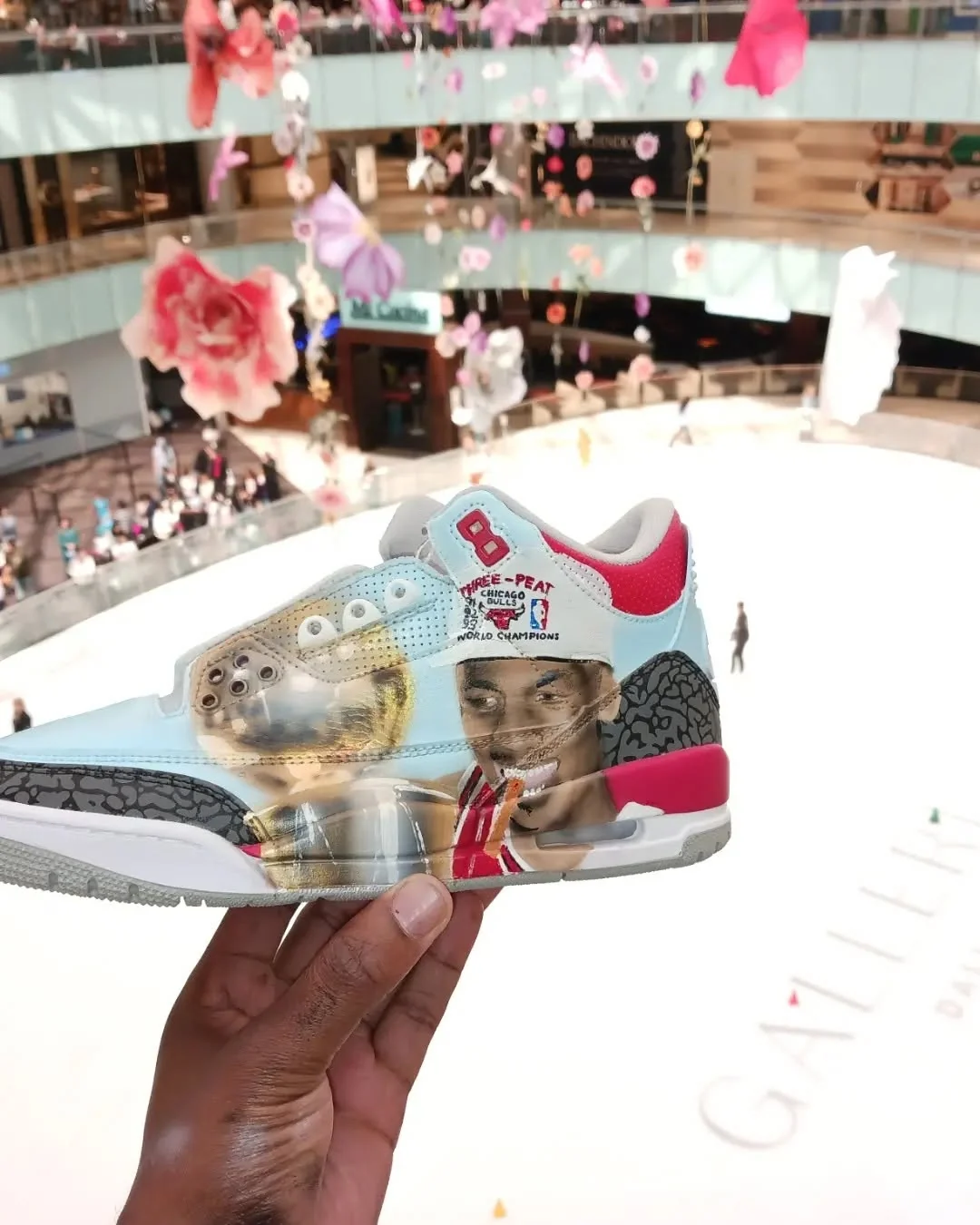 Custom sneaker piece shown at an event