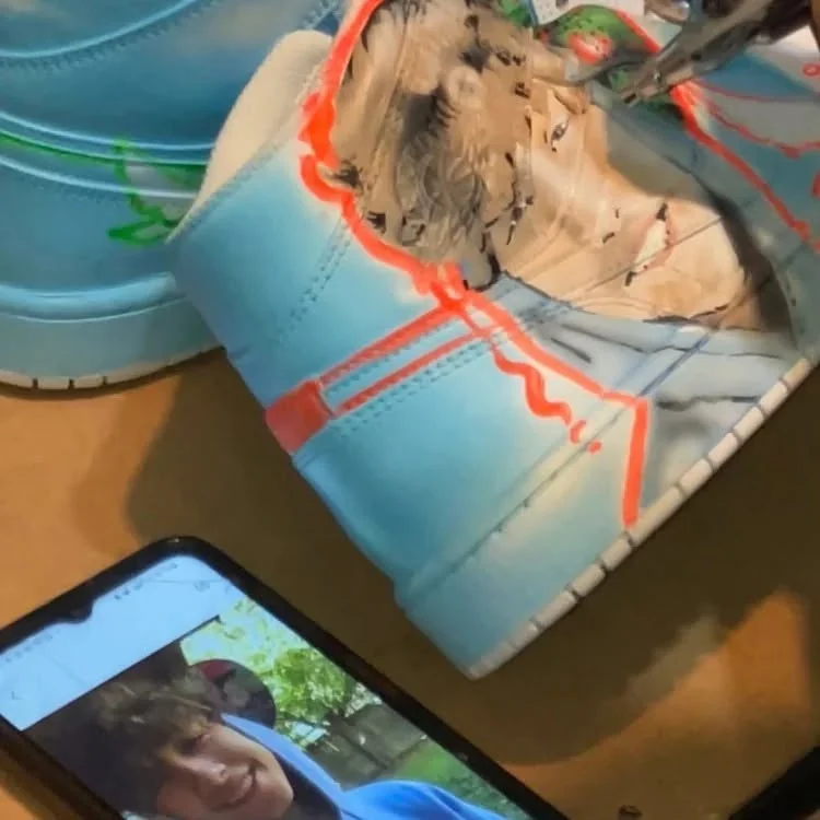 Airbrush work in progress on a custom sneaker