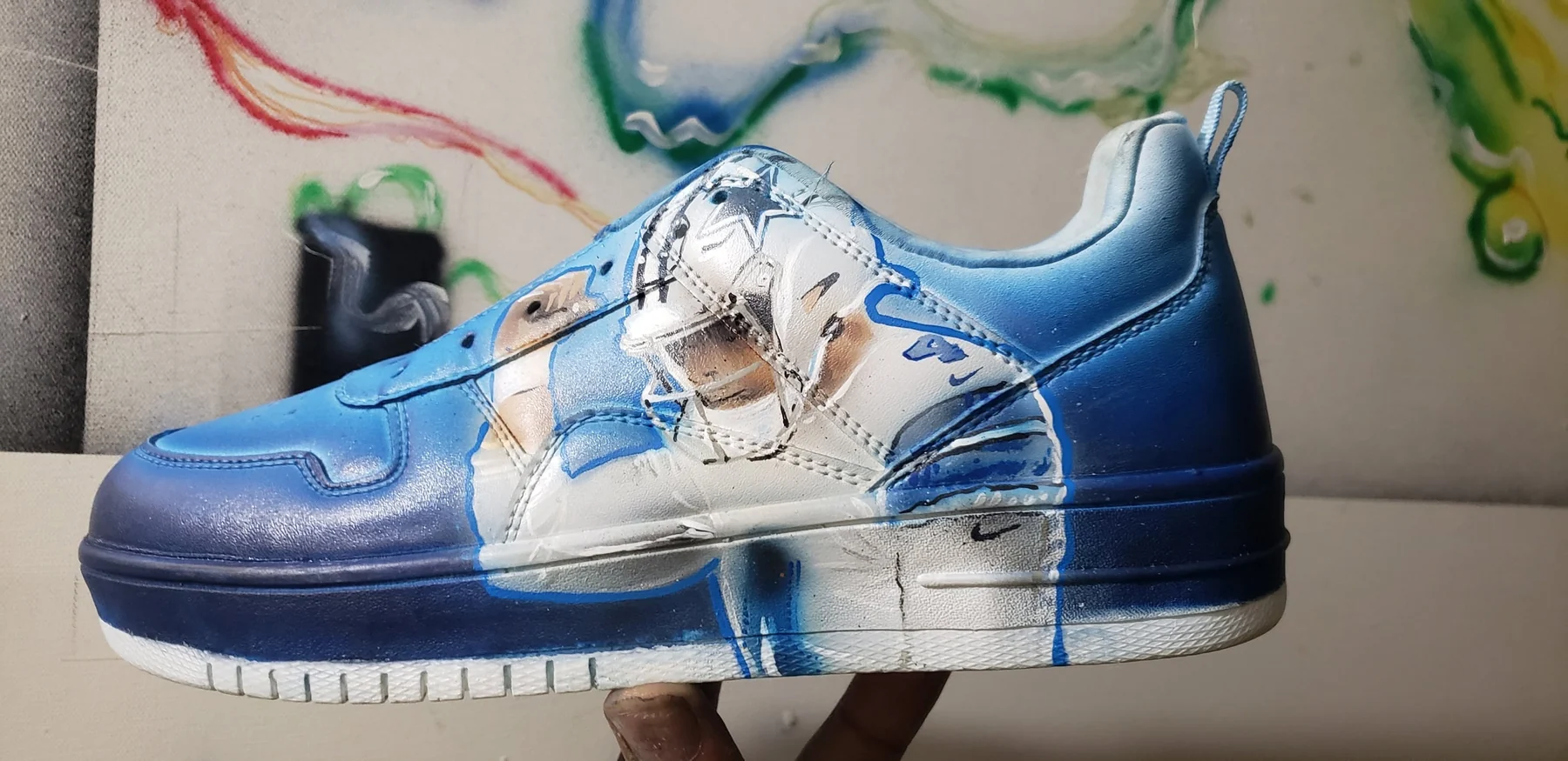 Blue custom sneaker with portrait artwork