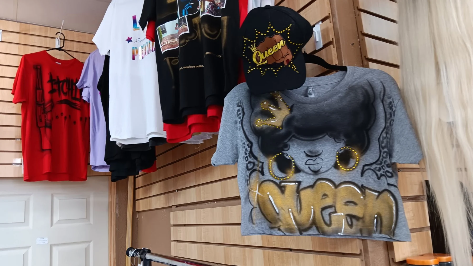 Display of custom painted shirts and apparel