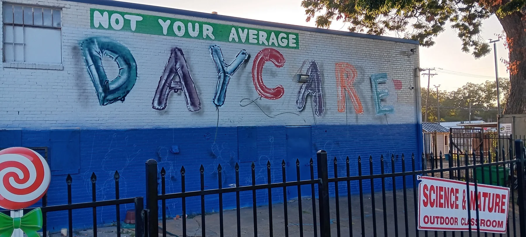 Large colorful exterior daycare mural